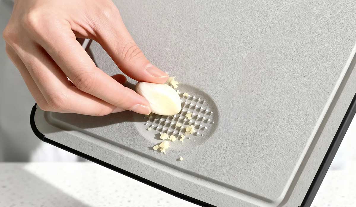 Built-in garlic grater